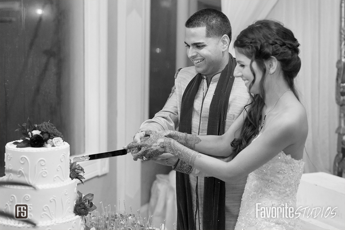 Picture of Bride and Groom Cutting Wedding Cake