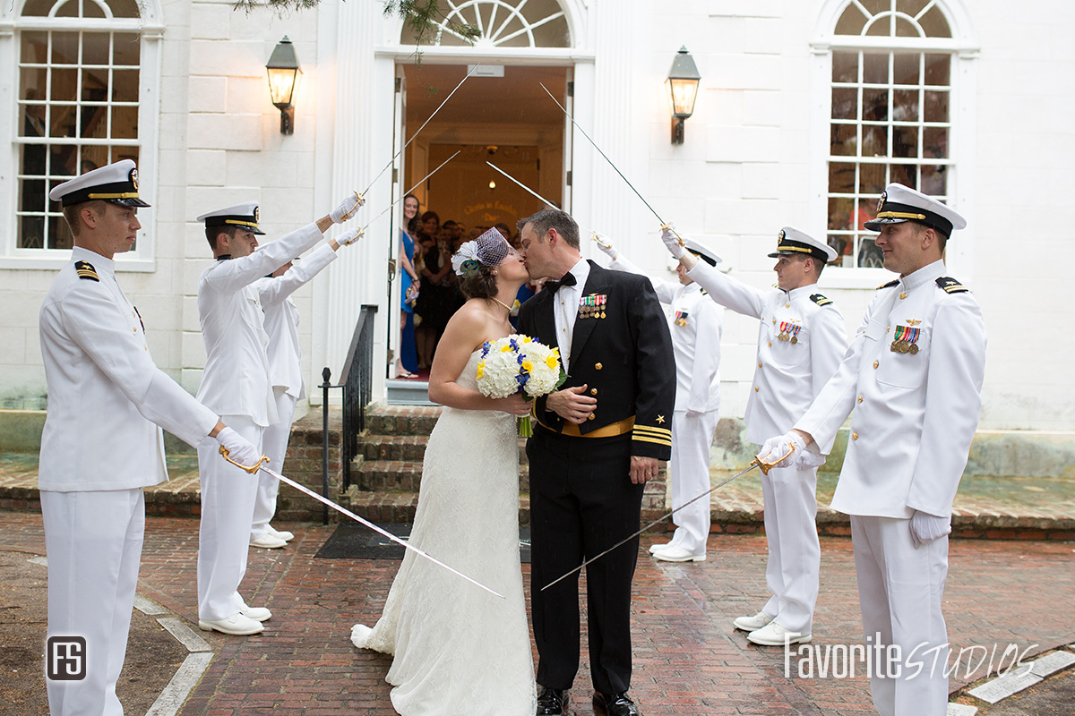 Navy Wedding Sword Arch Photo with a Kiss